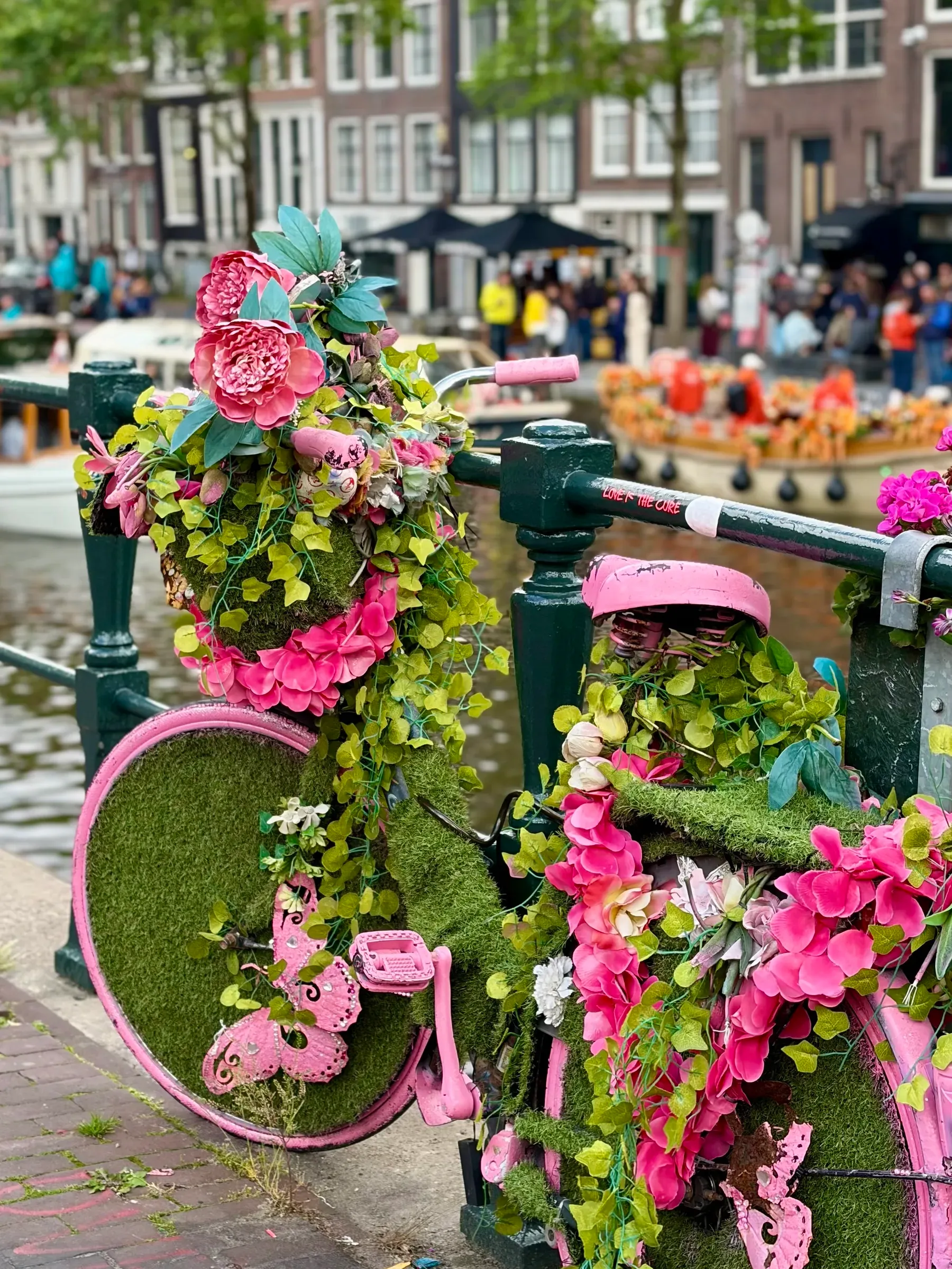 Flower-covered bicycle near the Prinsengracht