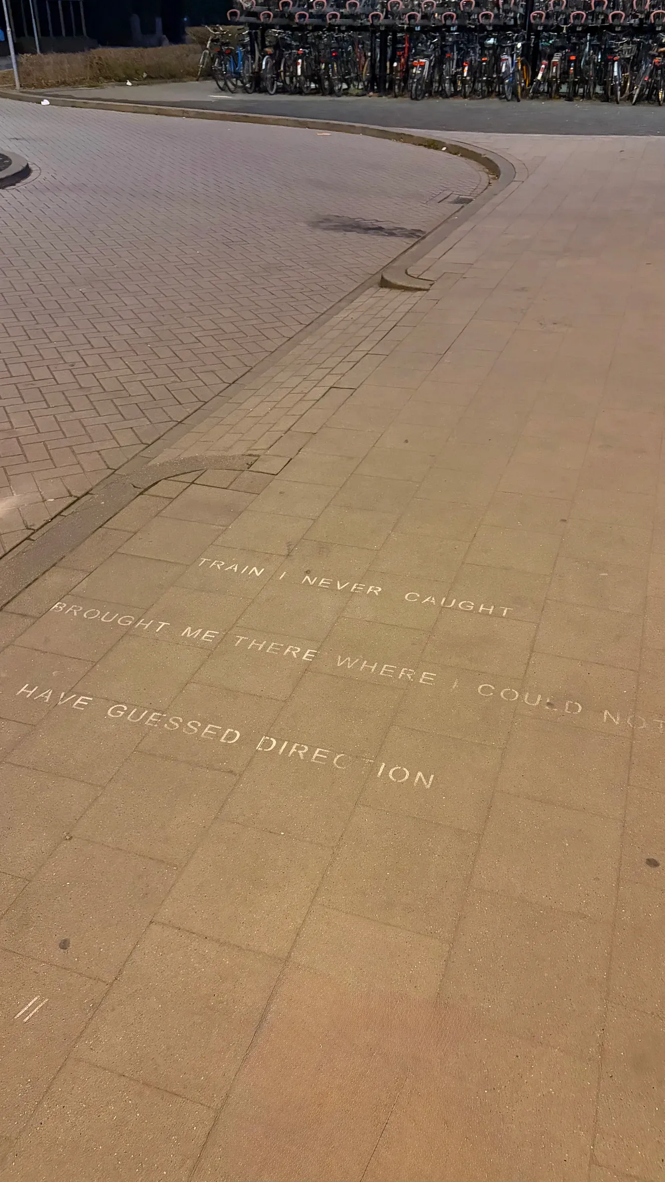 Wisława Szymborska poem inscribed in the pavement at Maastricht station