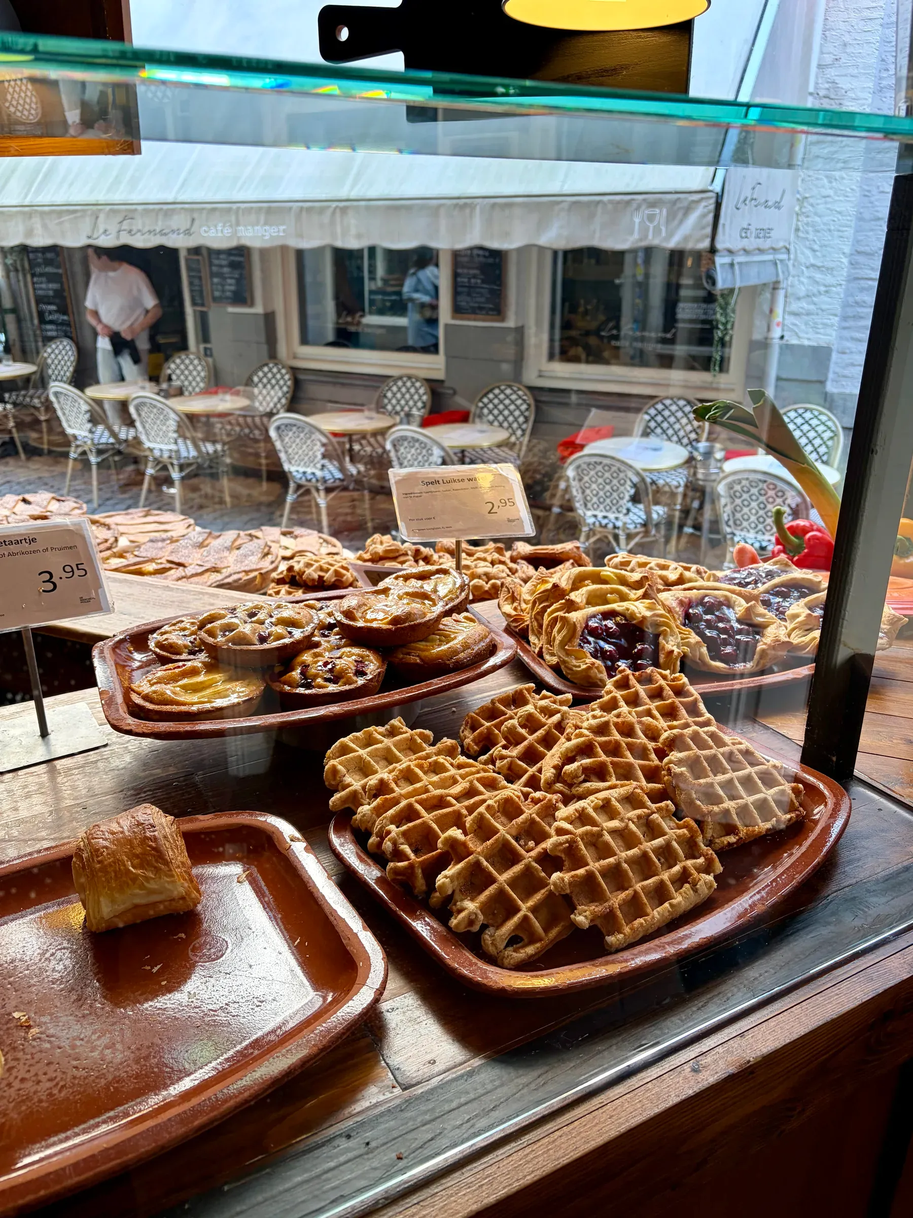 Bakery display with waffles and pastries at De Bisschopsmolen