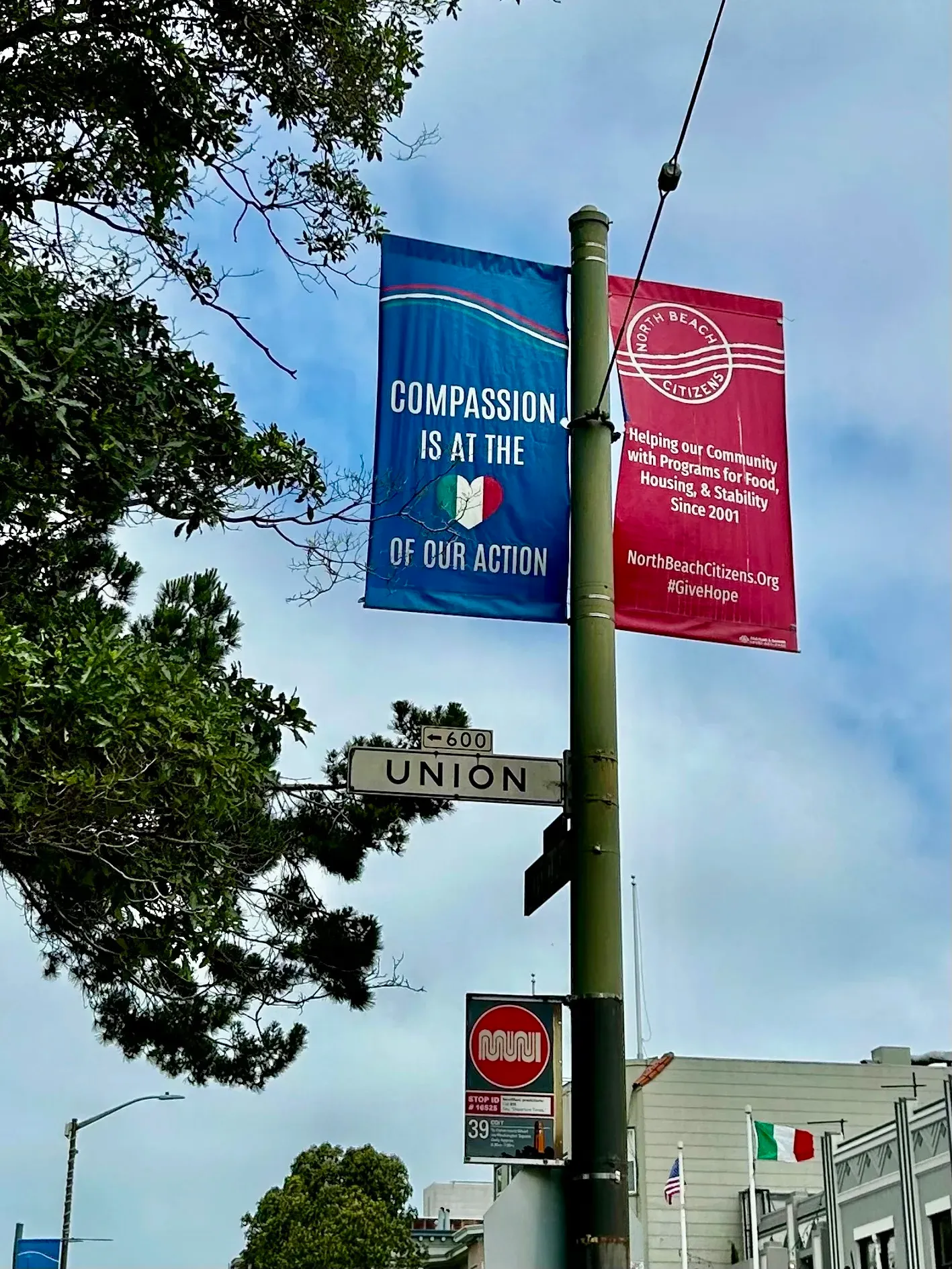 Street banners and signs near Washington Square in North Beach