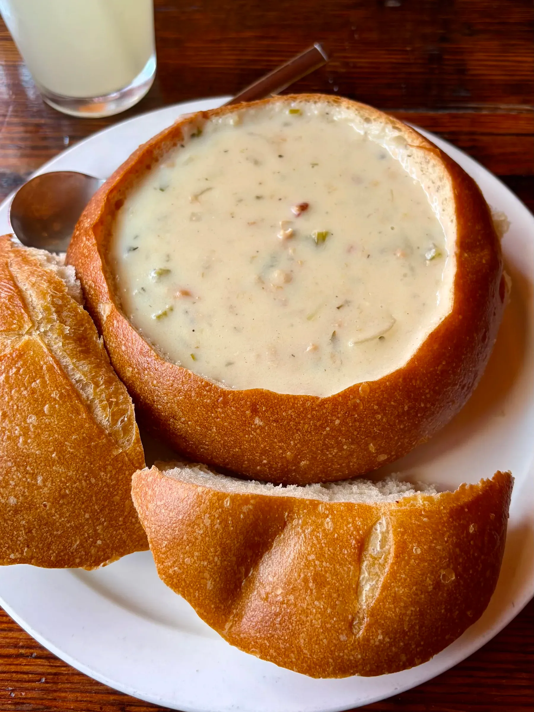 Creamy New England clam chowder served in a Boudin sourdough bread bowl