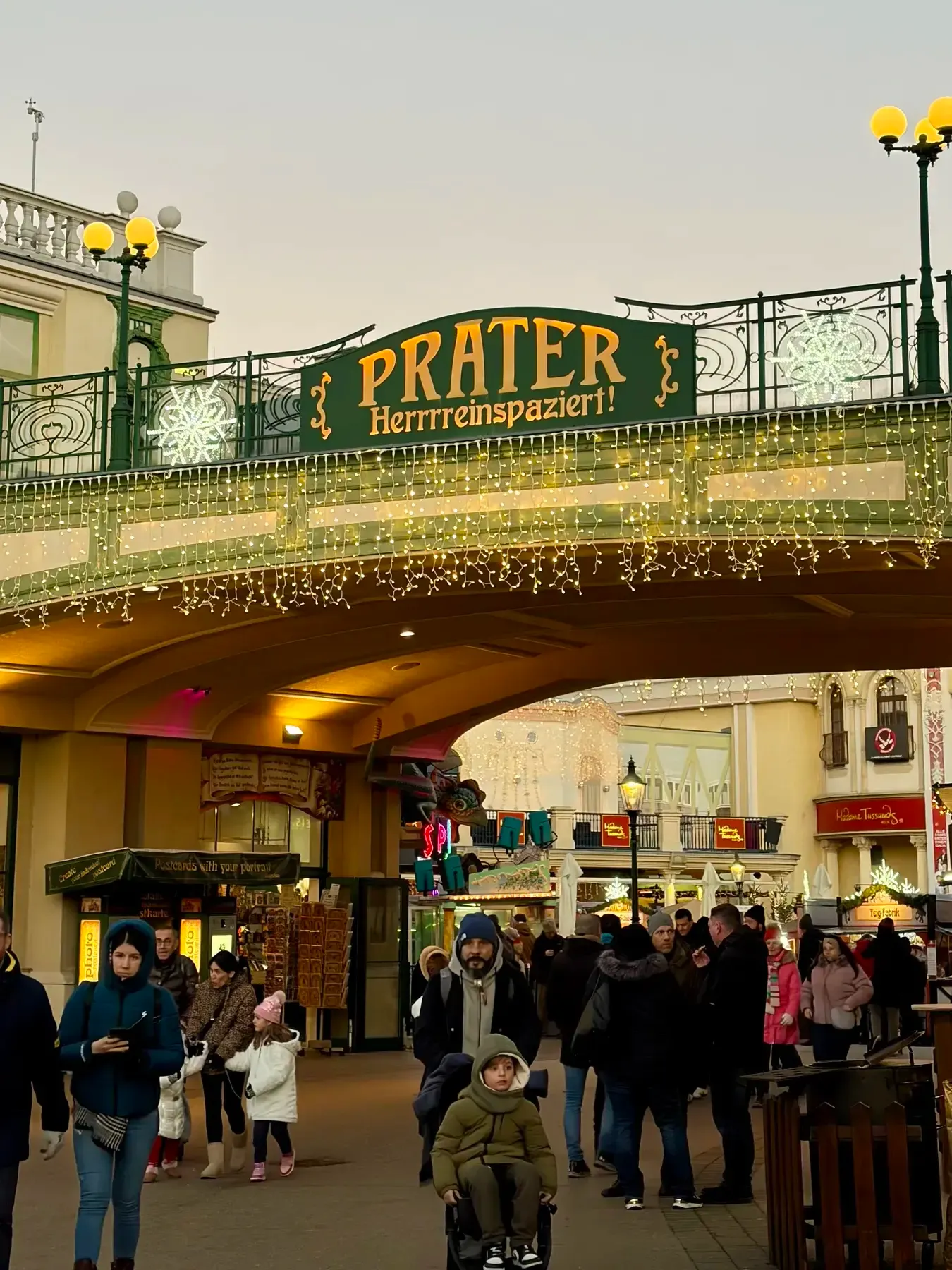 Prater entrance sign above a winter crowd