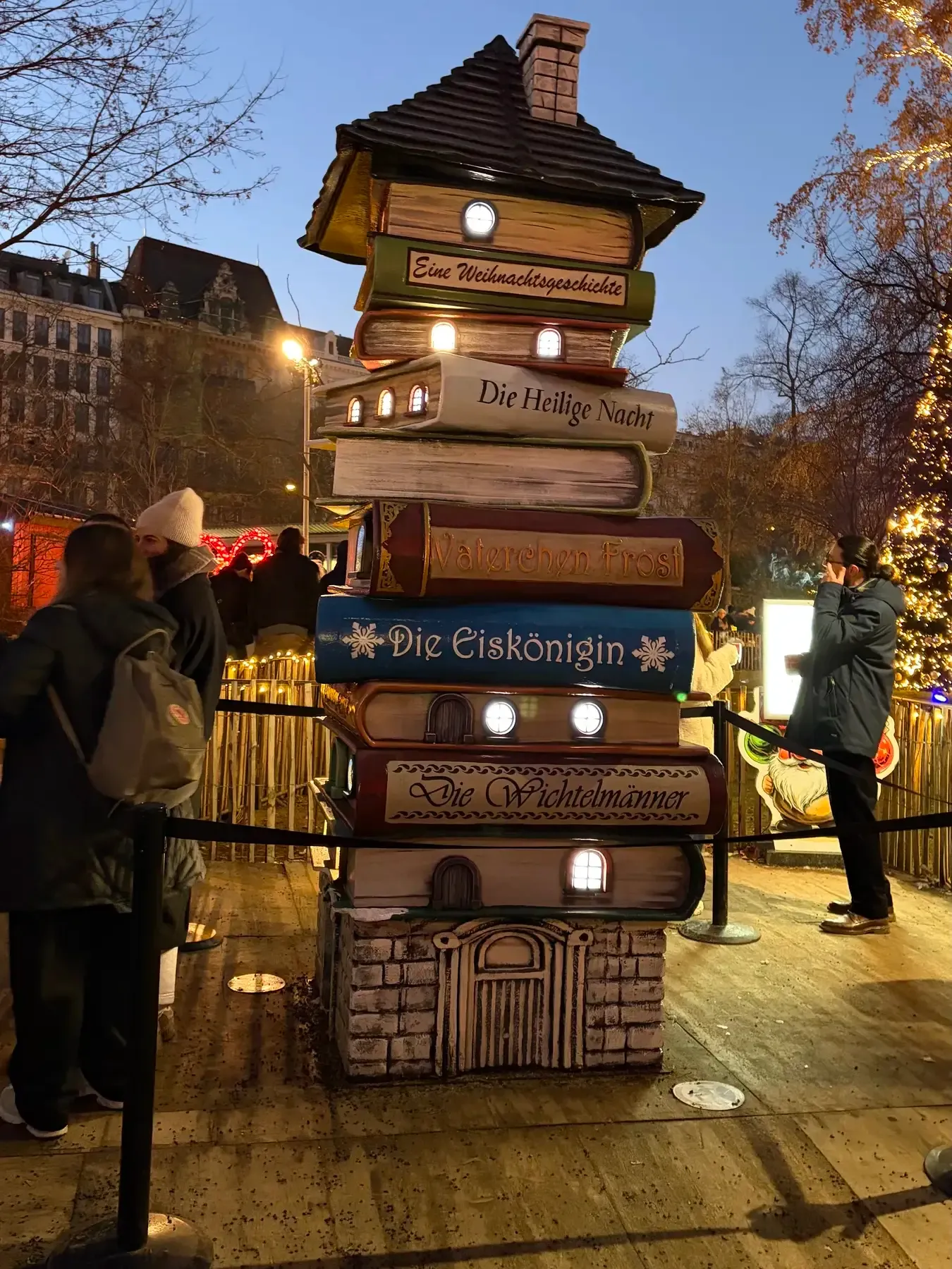 Stacked wooden signpost at the Rathausplatz Christmas market